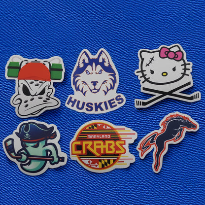 Set of six custom stickers on a blue textured background